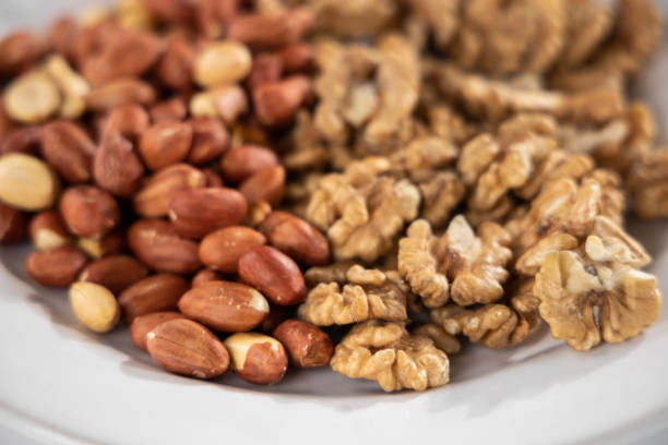 istock healthy pistachios and walnuts 1275224296