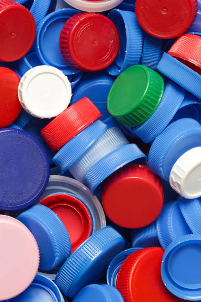 istock Heap of plastic bottle caps ready for recycling 1275226600