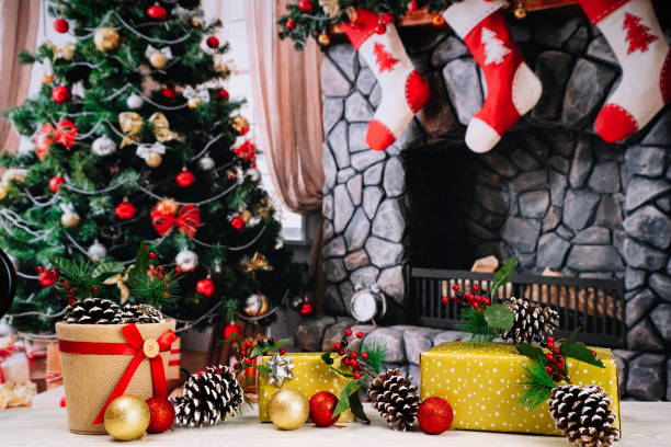 istock Christmas background with gifts, pine cones and tree 1275230888