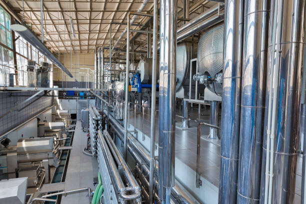 istock Stainless steel equipment for wine at modern winery. 1275235995