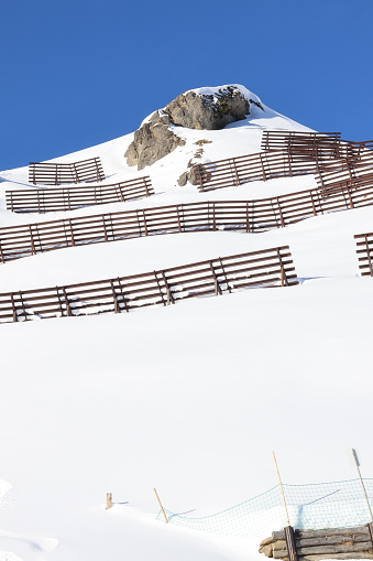 Close-up of an avalanche fence