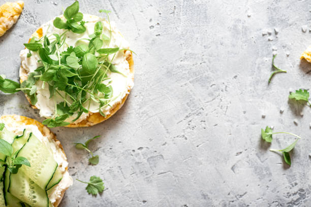 istock Sandwich with crispbread, ricotta, cucumber and microgreens 1275261984
