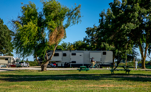 Bike riding at the Rv resort while camping in motorhomes and travel trailers