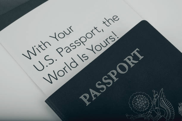 International American Passport (USA) covered piece of guide for new holders - With Your US Passport, the world is Yours! International American Passport (USA) covered piece of guide for new holders - With Your US Passport, the world is Yours! Toned black and white photo. blue us passport cover stock pictures, royalty-free photos & images
