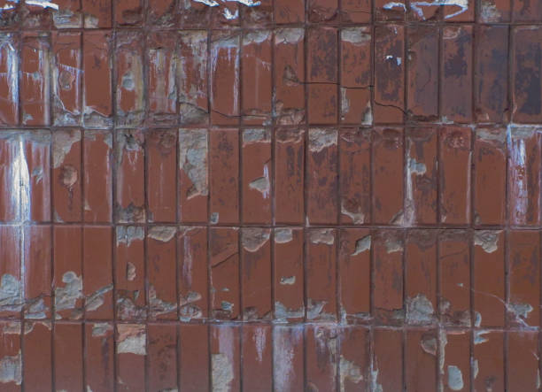 istock Old brown grunge tile wall background 1275326884