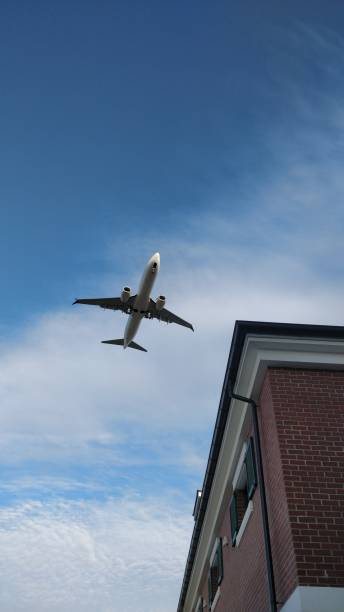 istock An Airplane in the blue sky 1275328885