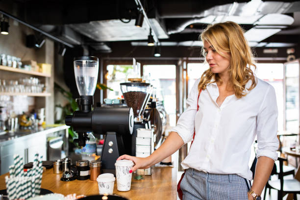 istock A businesswoman getting coffee to go 1275342779