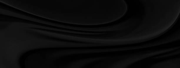 istock Black gray satin dark fabric texture luxurious shiny that is abstract silk cloth panorama background with patterns soft waves blur beautiful. 1275344763