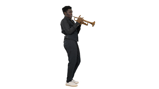 Wide shot. Side view. African american musician playing the trumpet expressively on white background. Professional shot in 4K resolution. 051. You can use it e.g. in your medical, commercial video, business, presentation, broadcast