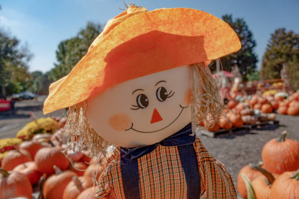istock Fall Autumn Scarecrow Smiling Doll Close up view. 1275353814