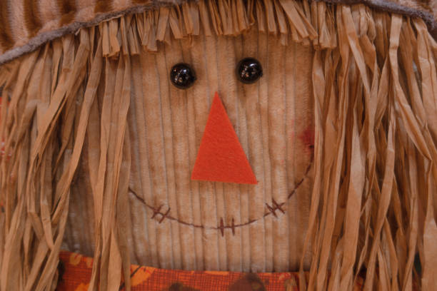 Happy smiling Halloween scarecrow puppet decorations.