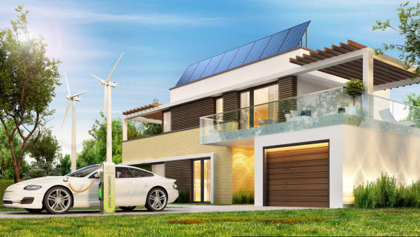 istock Ecological home with solar panels and electric car 1275368384