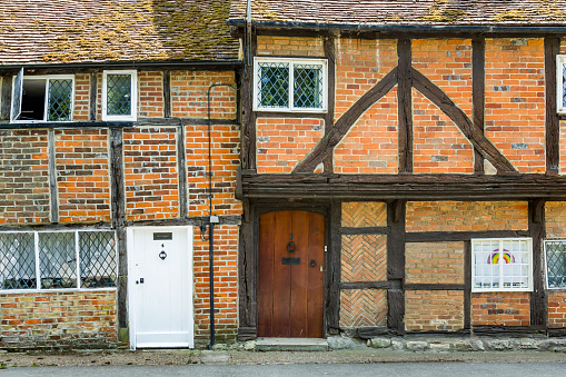 Row of old timber frame cottages in a Buckinghamshire village, UK