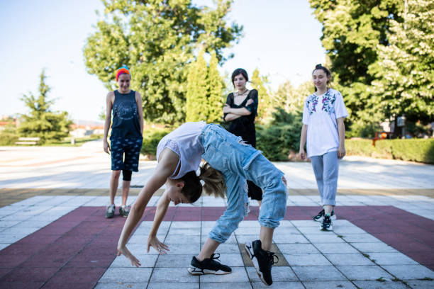istock Hip hop dancers in a dance-off 1275382954