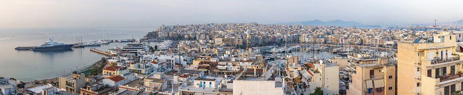 Panoramic view of Piraeus, the city port near Athens in Greece on a clear day. Picture taken from a rooftop.