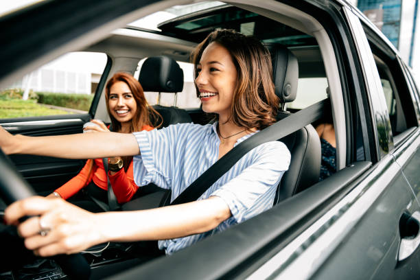 Friends Car Pooling Girl Friends Car Pooling carsharing photos stock pictures, royalty-free photos & images