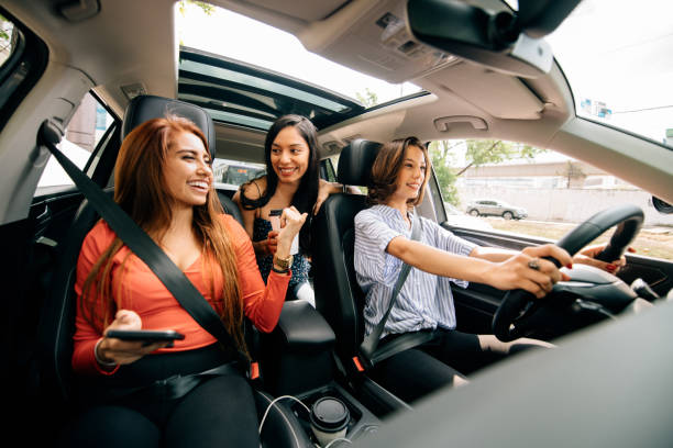 Friends Car Pooling Girl Friends Car Pooling vehicle accessory stock pictures, royalty-free photos & images