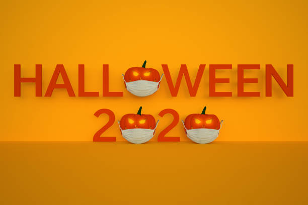 istock Halloween 2020 text with Jack O'Lantern wearing a protective face mask 1275434754