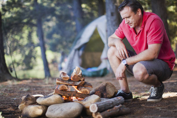 Man Creating Fire 15,800+ Man Making Fire Stock Photos, Pictures & Royalty-Free Images ...