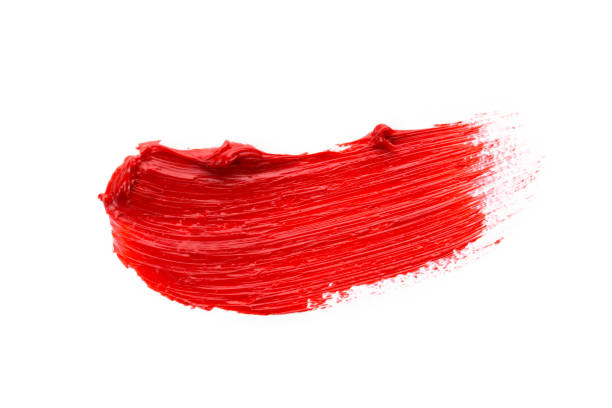 istock Lipstick smear smudge swatch isolated on white background. Cream makeup texture. Bright red color cosmetic product brush stroke swipe sample 1275466672