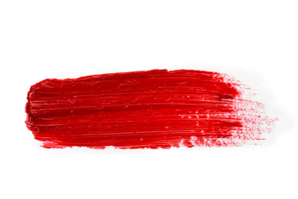 istock Lipstick smear smudge swatch isolated on white background. Cream makeup texture. Bright red color cosmetic product brush stroke swipe sample 1275468579