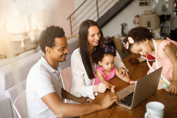 istock Family scheduling the trip together by laptop 1275500112