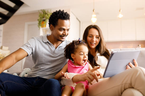 istock Family booking the trip together on digital tablet 1275500267