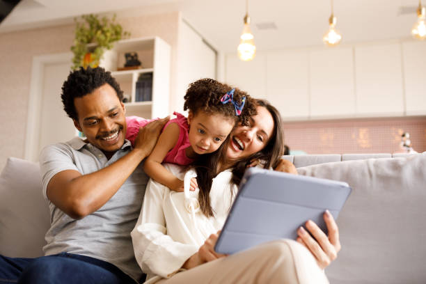 istock Family booking the trip together on digital tablet 1275501343