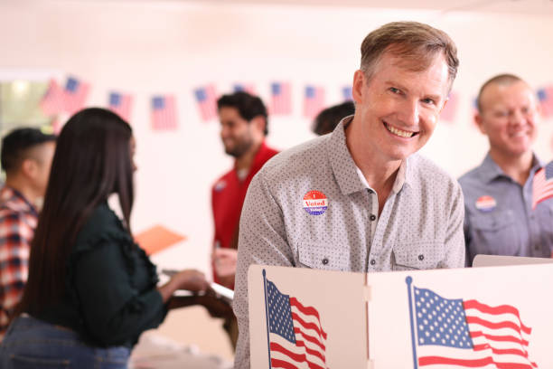 istock Senior adult man votes in USA election. 1275524632