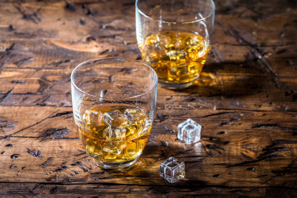 istock Whiskey with ice in glasses 1275525366