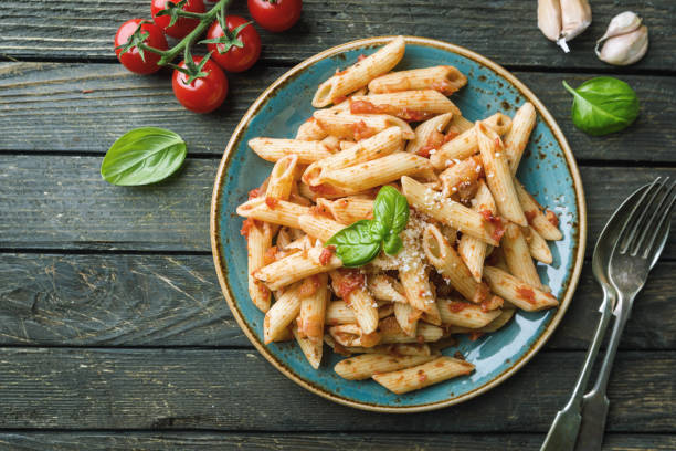 istock Penne pasta in tomato sauce 1275527070