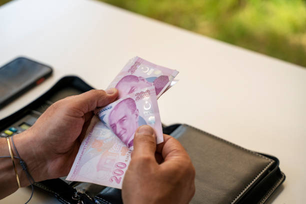 Man Counting Turkish Lira stock photo