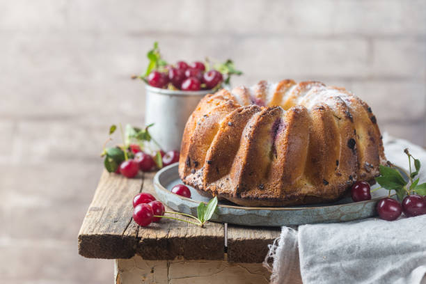 istock Fresh bundt cake with cherry 1275538288