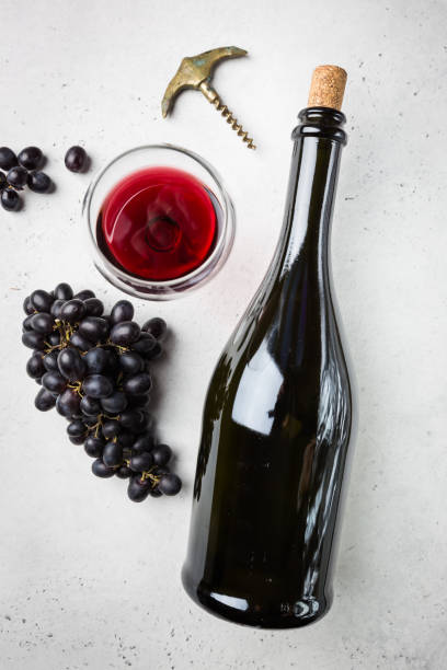 istock Red wine and ripe grapes 1275541270