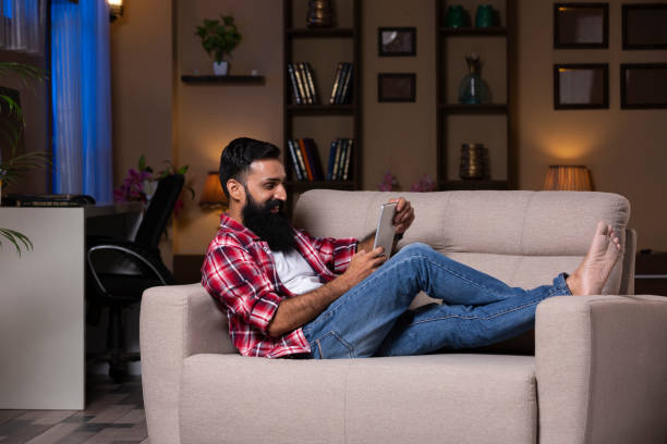 istock Young man at home - stock photo 1275542669