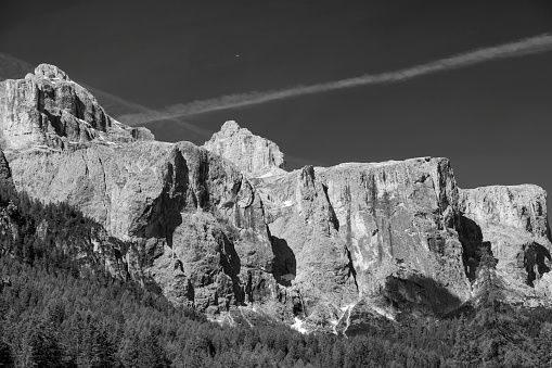 Mountain landscape at summer along the road to Gardena pass, Dolomites, Bolzano province, Trentino Alto Adige, Italy. Black and white