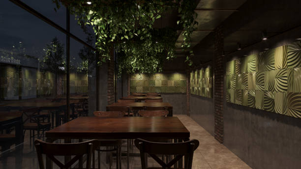 istock Tables and Chairs Inside an Empty Illuminated Restaurant During the Nighttime 1275565054