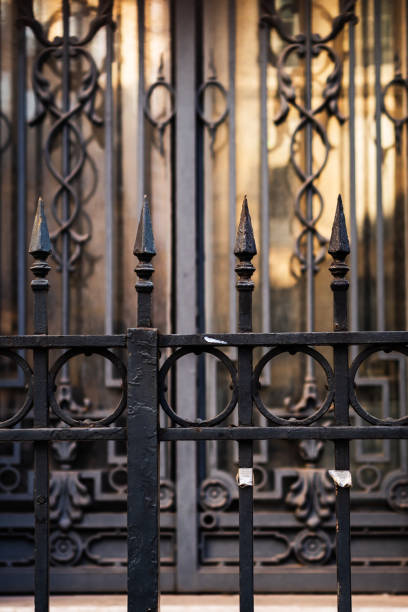 istock Wrought iron entrance gate 1275570250