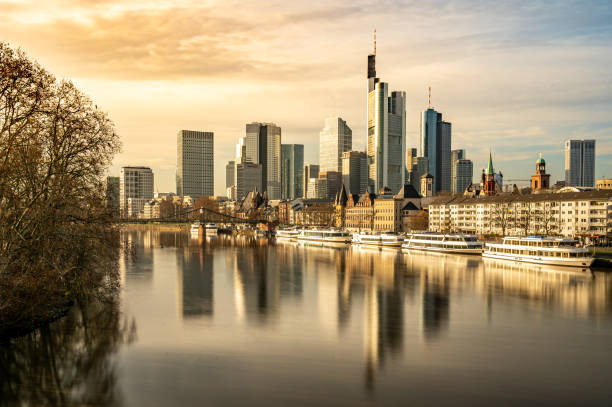 istock frankfurt skyline with reflections in the main river, frankfurt am main, germany 1275570474