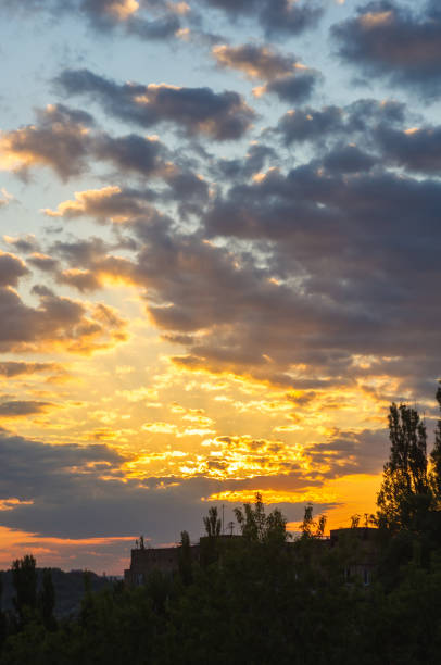 istock Landscape with dramatic light - beautiful golden sunset with saturated sky and clouds. 1275572122