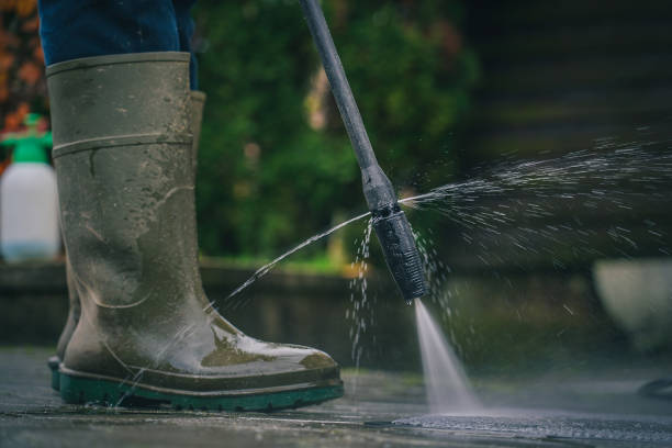 istock Cleaning a floor mat with high pressure water cleaner 1275579399