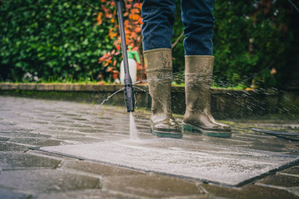 istock Cleaning a floor mat with high pressure water cleaner 1275579416