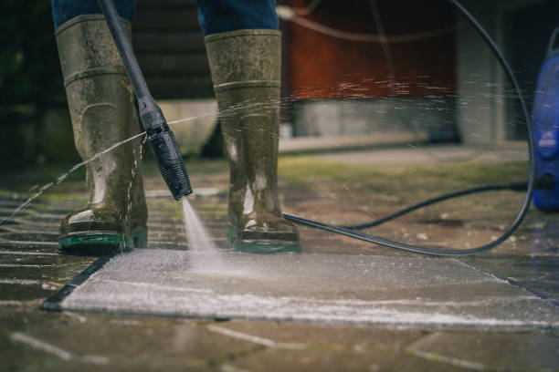 istock Cleaning a floor mat with high pressure water cleaner 1275579428