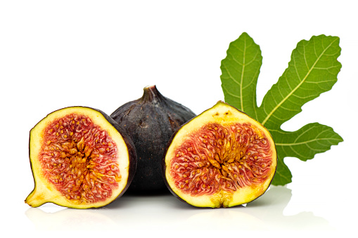 Homegrown organic figs, isolated on white background.