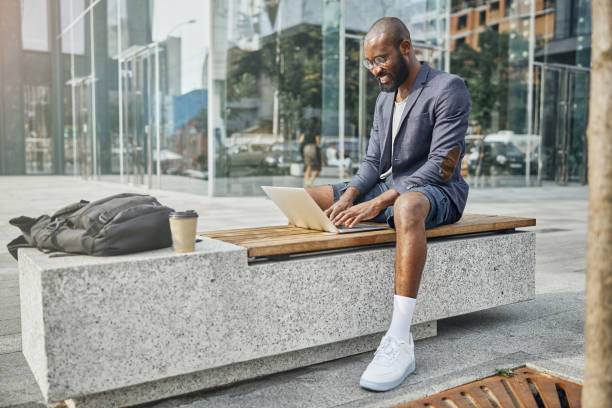 istock Positive delighted bearded male working on distance 1275618169
