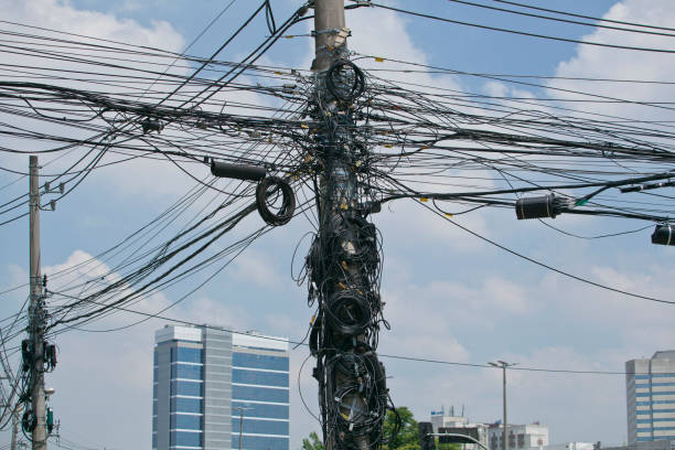 São Paulo, SP, Brazil - 11th march 2020: Tangle of wires on a pole in the streets of Barueri, Greater São Paulo.