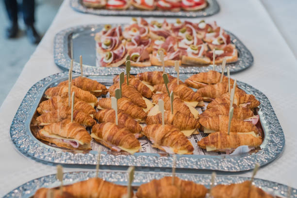 istock Sandwiches from croissants at a banquet 1275644714