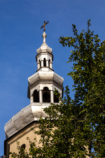 Tower of the church in Polska Cerekiew, blue sky