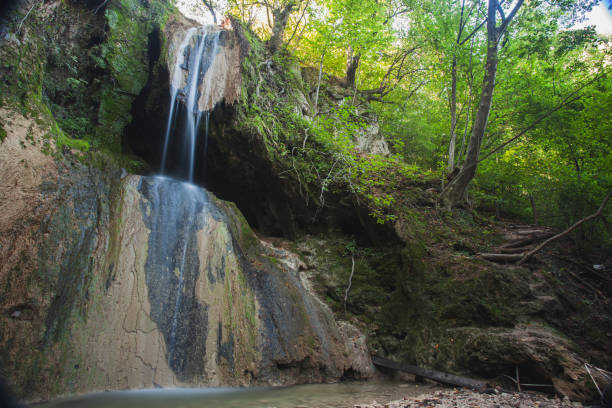 istock Exploring the mountains waterfall and enjoying in nature 1275676048