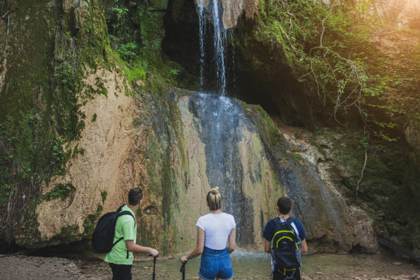 istock Exploring the mountains waterfall and enjoying in nature 1275677109